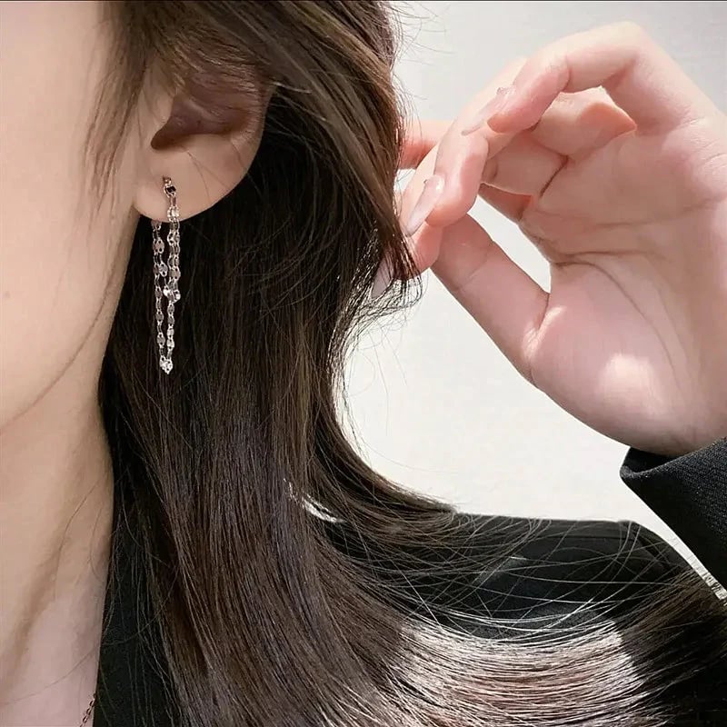 Tassel earrings with sequin chain