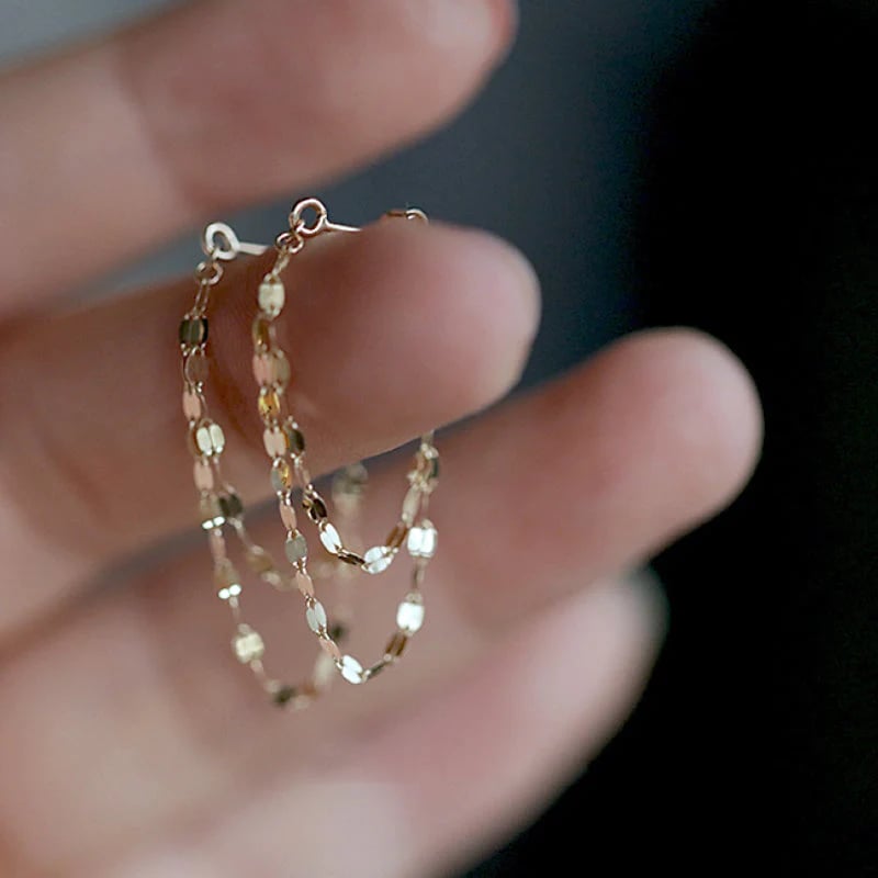 Tassel earrings with sequin chain