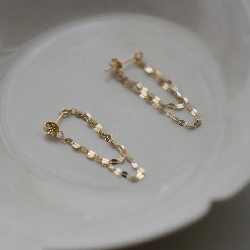 Tassel earrings with sequin chain